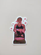 sticker Stella posé sur un fond crème neutre en gros plan